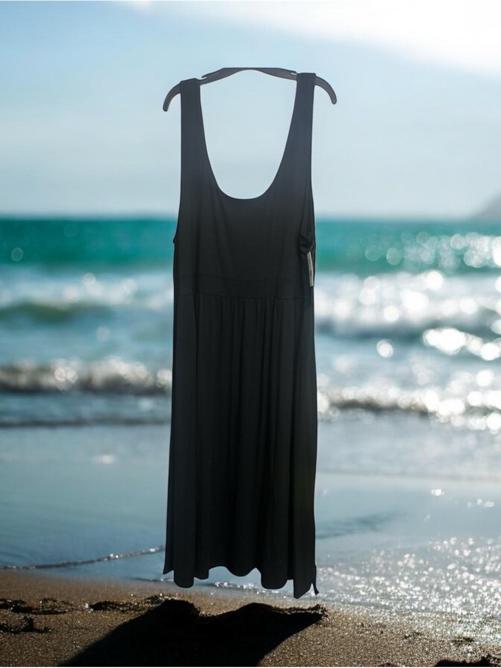 Black Tape_ Elegant Black Sleeveless Maxi Dress